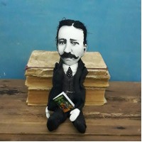 L. FrankBaum doll