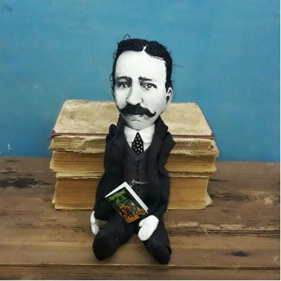 L. FrankBaum doll
