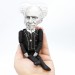 Arthur Schopenhauer philosopher pessimist figurine 